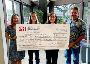 General Contractors Association of Hawaii presents a check to DVAC