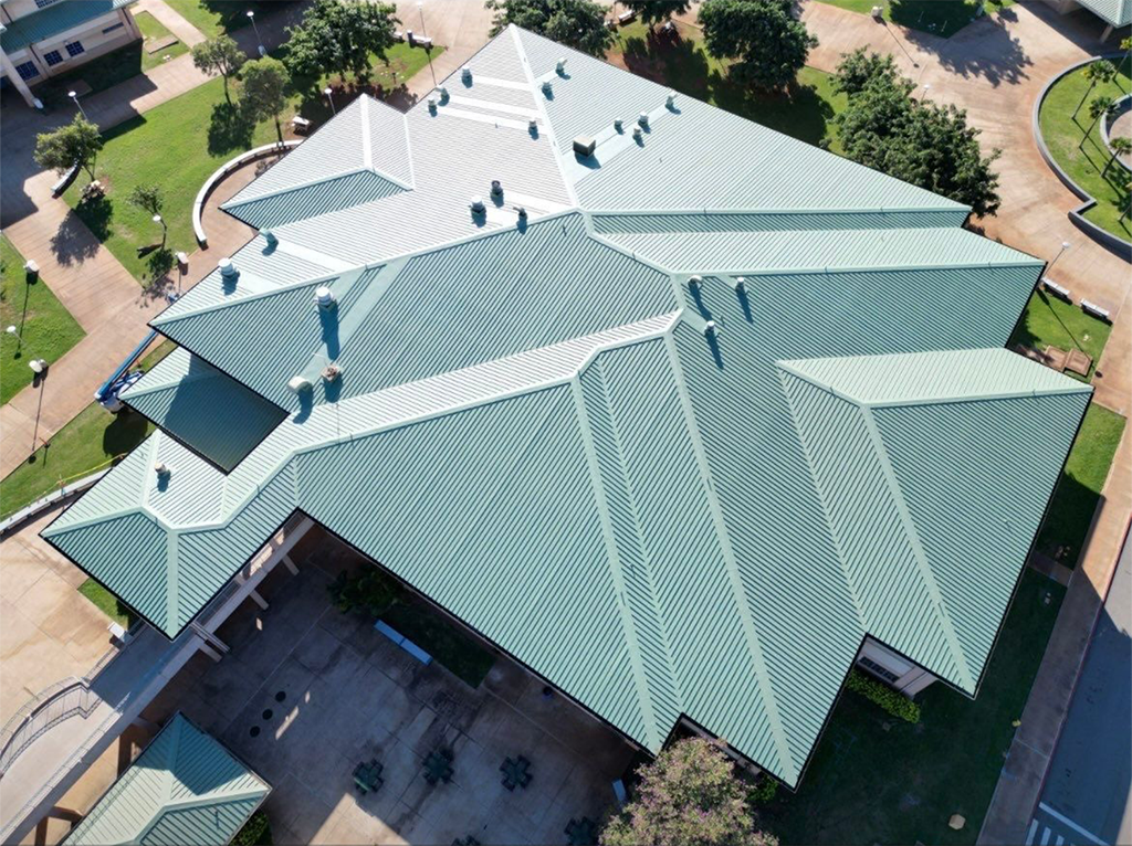 About half of Kapili Roofing’s projects in 2023 were for the public sector, including a reroof at 
Kapolei High School.