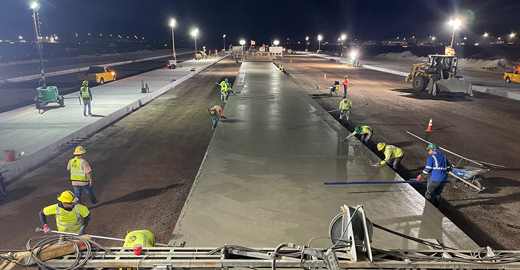 Kiewit’s completed Runway 8L project at DKI International Airport includes 69,000 cubic yards of concrete and asphalt demolition, 45,000 cubic yards of new concrete paving and 144,000 tons of asphalt paving, new runway lighting and runway navigational aids.PHOTOS COURTESY KIEWIT CORP.