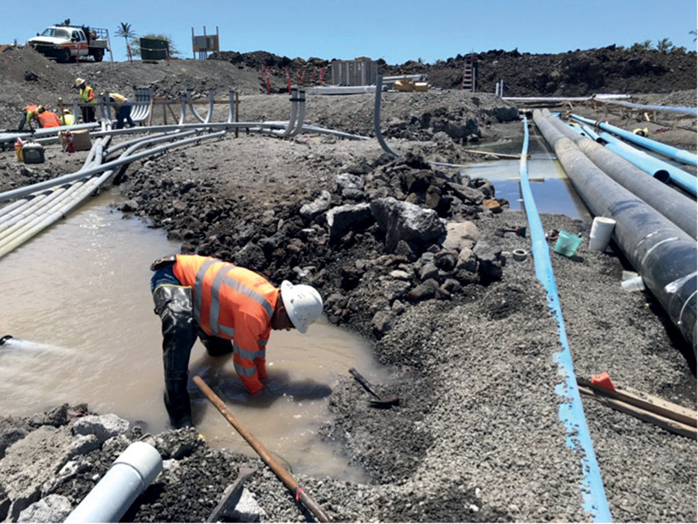 Workers install electrical conduits on a jobsite.


PHOTOS COURTESY GOODFELLOW BROS.