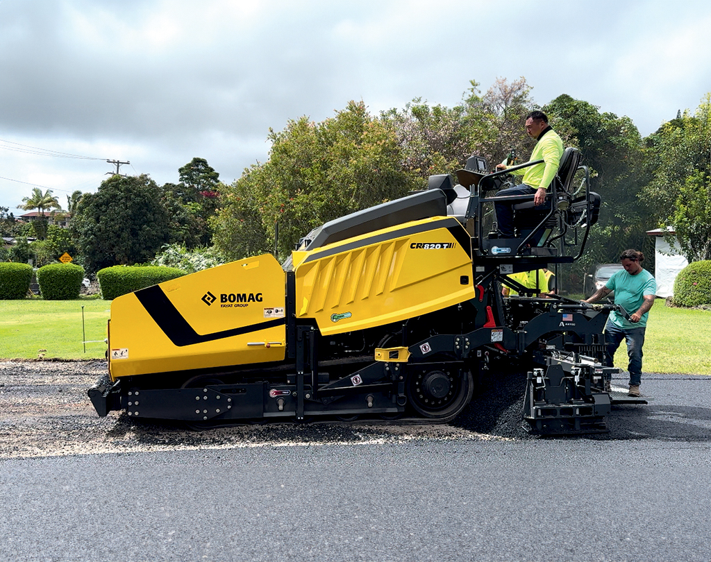 Isemoto Contracting workers on the Big  Island use a new BOMAG CR820T asphalt paver purchased from Bacon Universal.PHOTO COURTESY ISEMOTO CONTRACTING CO. LTD.