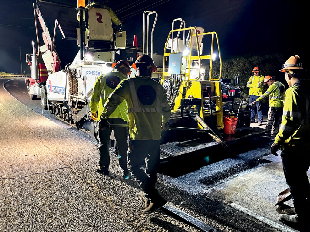 Jas. W Glover places a second lift of PMA Mix IV during restoration work on Ku-hio- Highway  near Kealia Beach on Kaua‘i.PHOTO COURTESY JAS W. GLOVER LTD./DANIEL MATSUMOTO