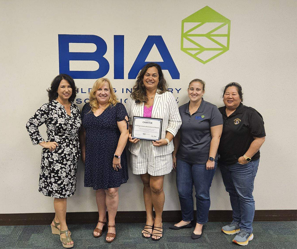 BIA Hawaii celebrates receiving its 2024 charter from the Women in Building Council with, from left, Vice President Kamuela Potter, CEO Roseann Freitas, 2024 President Hinano Nahinu, Immediate Past President Sarah Love and Director Lili Shintani.